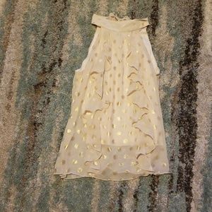 A. Buyers gold polka dot blouse